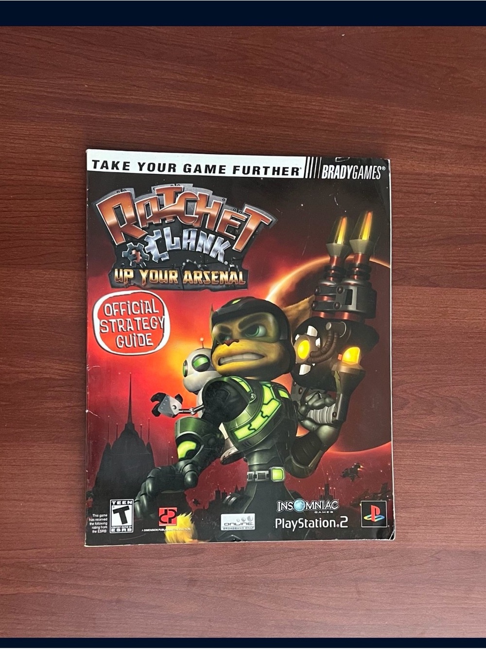Sony Ratchet & Clank Up Your Arsenal Strategy Guide - Red, Black, Green